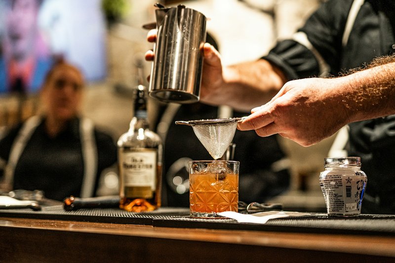 Mixologists making cocktails in NYC